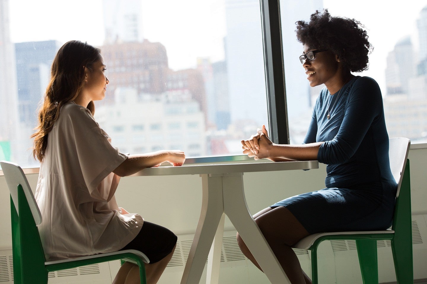 Two women engaging in conversation